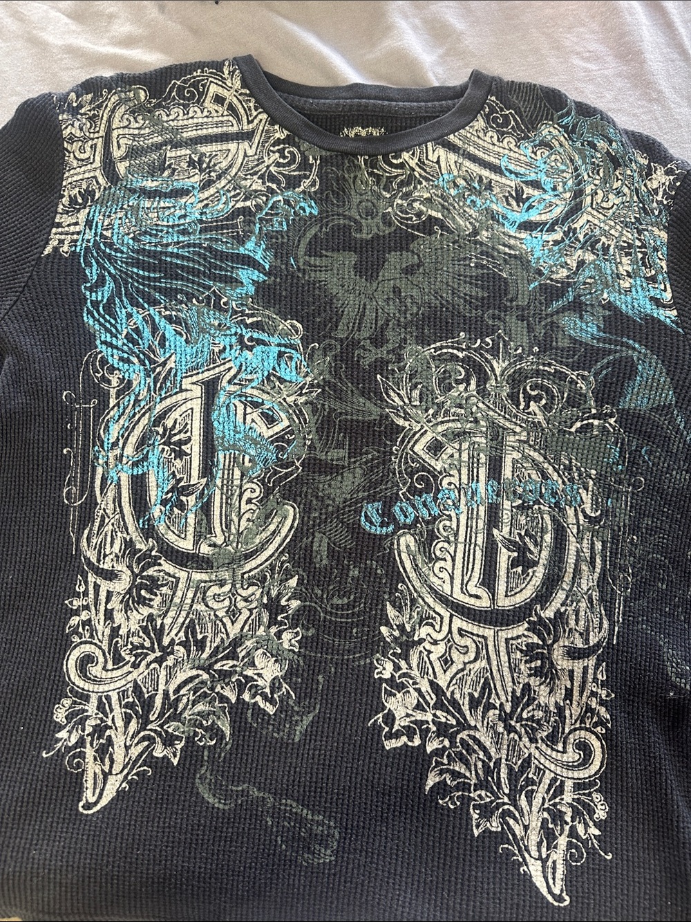 Men's Black Long-Sleeve Graphic Thermal Tee with Teal Accents